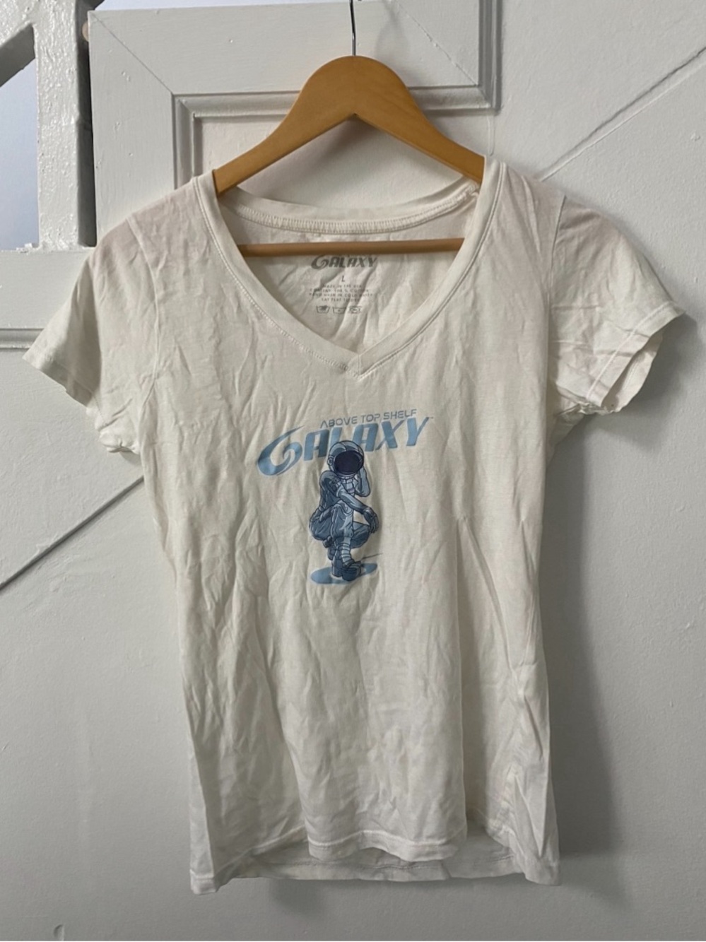 Galaxy By Harvic White V-Neck Tee with Blue Astronaut Graphic